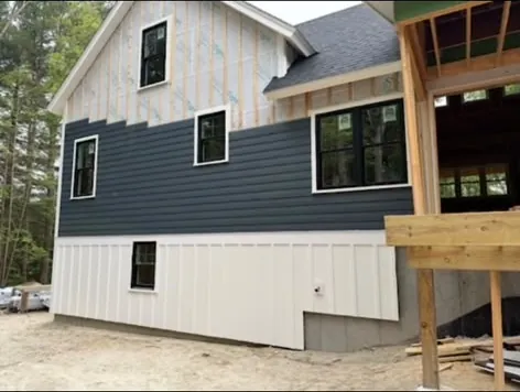 Board-and-batten and lap siding in progress