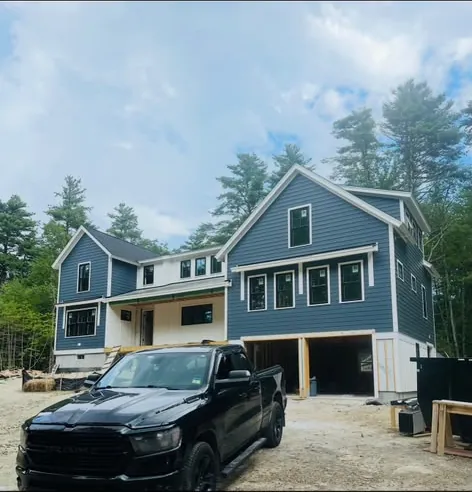 New home exterior with blue siding