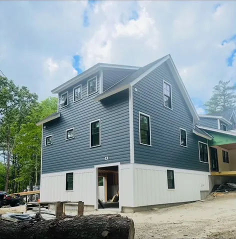 Blue lap siding and white trim